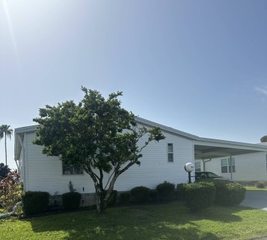 Charming 2-Bedroom Home with Sunroom in a Wonderful on Schalamar Creek Golf and Country Club in Florida - for sale on GolfHomes.com, golf home, golf lot