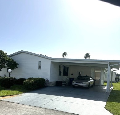 Charming 2-Bedroom Home with Sunroom in a Wonderful on Schalamar Creek Golf and Country Club in Florida - for sale on GolfHomes.com, golf home, golf lot