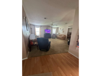 Charming 2-Bedroom Home with Sunroom in a Wonderful on Schalamar Creek Golf and Country Club in Florida - for sale on GolfHomes.com, golf home, golf lot