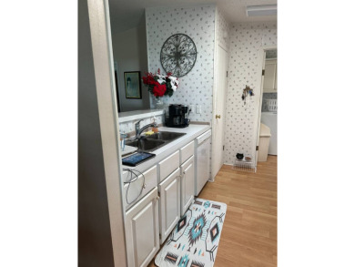 Charming 2-Bedroom Home with Sunroom in a Wonderful on Schalamar Creek Golf and Country Club in Florida - for sale on GolfHomes.com, golf home, golf lot