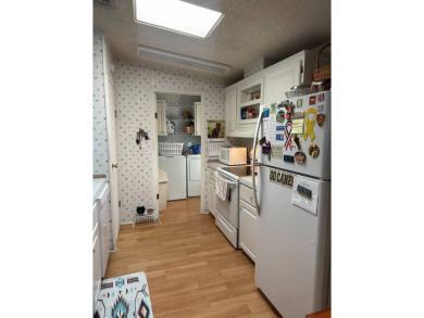 Charming 2-Bedroom Home with Sunroom in a Wonderful on Schalamar Creek Golf and Country Club in Florida - for sale on GolfHomes.com, golf home, golf lot