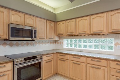 Welcome to this spacious three-bedroom on East Lake Woodlands Country Club in Florida - for sale on GolfHomes.com, golf home, golf lot