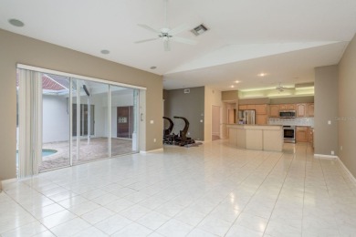Welcome to this spacious three-bedroom on East Lake Woodlands Country Club in Florida - for sale on GolfHomes.com, golf home, golf lot