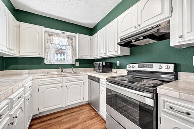 This inviting 3-bedroom, 1.5-bath single-story townhome offers a on Bella Vista Country Club and Golf Course in Arkansas - for sale on GolfHomes.com, golf home, golf lot