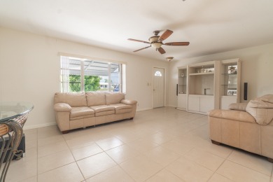 Oversized .21-acre lot with canal access--fish from your on Leisureville Community Golf Course in Florida - for sale on GolfHomes.com, golf home, golf lot