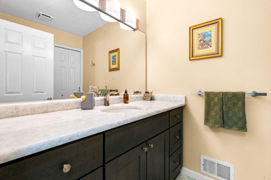 A rare opportunity in Laurel Gardens-this spacious end-unit on Radrick Farms Golf Club in Michigan - for sale on GolfHomes.com, golf home, golf lot