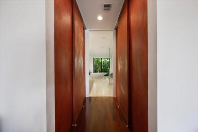 Nestled in the heart of Palm Beach Polo, this lovely 4-bedroom on Palm Beach Polo and Country Club in Florida - for sale on GolfHomes.com, golf home, golf lot