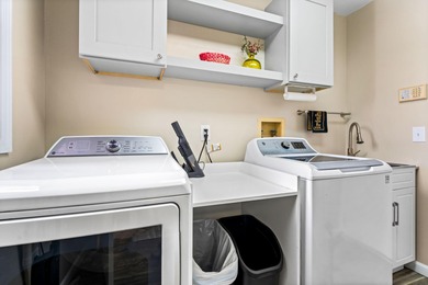 A rare opportunity in Laurel Gardens-this spacious end-unit on Radrick Farms Golf Club in Michigan - for sale on GolfHomes.com, golf home, golf lot