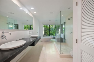 Nestled in the heart of Palm Beach Polo, this lovely 4-bedroom on Palm Beach Polo and Country Club in Florida - for sale on GolfHomes.com, golf home, golf lot