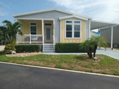 LOCATION! LOCATION!! 3 BEDROOM, 2 BATH (2016 Palm Harbor) -- on Spessard Holland Golf Course in Florida - for sale on GolfHomes.com, golf home, golf lot