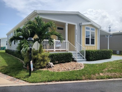 LOCATION! LOCATION!! 3 BEDROOM, 2 BATH (2016 Palm Harbor) -- on Spessard Holland Golf Course in Florida - for sale on GolfHomes.com, golf home, golf lot