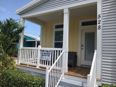 LOCATION! LOCATION!! 3 BEDROOM, 2 BATH (2016 Palm Harbor) -- on Spessard Holland Golf Course in Florida - for sale on GolfHomes.com, golf home, golf lot