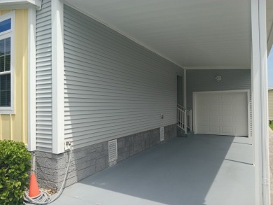LOCATION! LOCATION!! 3 BEDROOM, 2 BATH (2016 Palm Harbor) -- on Spessard Holland Golf Course in Florida - for sale on GolfHomes.com, golf home, golf lot