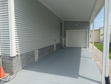 LOCATION! LOCATION!! 3 BEDROOM, 2 BATH (2016 Palm Harbor) -- on Spessard Holland Golf Course in Florida - for sale on GolfHomes.com, golf home, golf lot