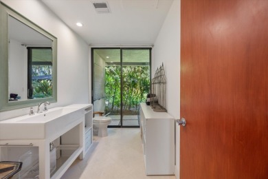 Nestled in the heart of Palm Beach Polo, this lovely 4-bedroom on Palm Beach Polo and Country Club in Florida - for sale on GolfHomes.com, golf home, golf lot