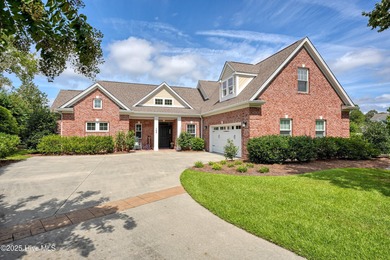 Welcome to this amazing custom built 4 bedroom, 4.5 bath home on Ocean Ridge Plantation in North Carolina - for sale on GolfHomes.com, golf home, golf lot