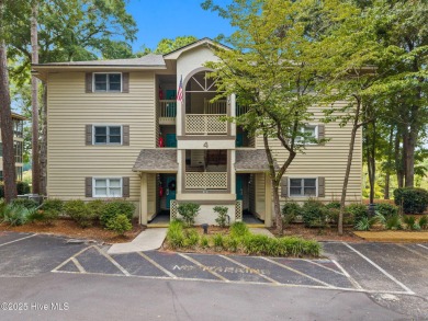 Welcome to your coastal haven--a completely upgraded first-floor on Sea Trail Golf Resort in North Carolina - for sale on GolfHomes.com, golf home, golf lot