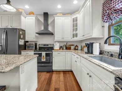 Located behind the gates, and a short golf cart ride to all on Rumbling Bald Resort on Lake Lure in North Carolina - for sale on GolfHomes.com, golf home, golf lot
