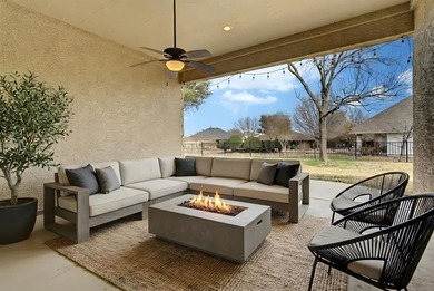 Welcome home! This spacious Sonoma floor plan is nestled along a on Wildhorse Golf Club of Robson Ranch in Texas - for sale on GolfHomes.com, golf home, golf lot