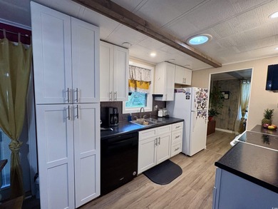 Coastal Living at Its Best! Charming 2 Bed / 2 Bath Beach on Indigo Creek Golf Club in South Carolina - for sale on GolfHomes.com, golf home, golf lot