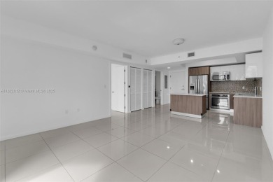 Live the urban lifestyle at 5252 Paseo! Bright and modern 1 on Doral Golf Resort in Florida - for sale on GolfHomes.com, golf home, golf lot
