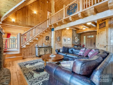 Classic log cabin, conveniently located behind the gates of on Rumbling Bald Resort on Lake Lure in North Carolina - for sale on GolfHomes.com, golf home, golf lot