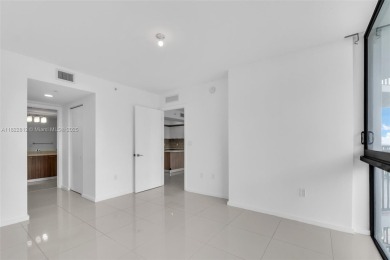 Live the urban lifestyle at 5252 Paseo! Bright and modern 1 on Doral Golf Resort in Florida - for sale on GolfHomes.com, golf home, golf lot