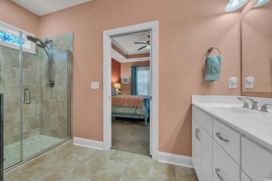 Relax on the welcoming front porch and soak up the sunshine in on Surf Golf and Beach Club in South Carolina - for sale on GolfHomes.com, golf home, golf lot