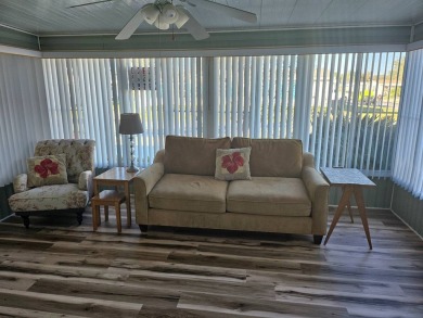 THIS 2/2 IS FURNISHED AND FEATURES AN ENCLOSED FRONT LANAI (200 on Southport Springs Golf Club in Florida - for sale on GolfHomes.com, golf home, golf lot