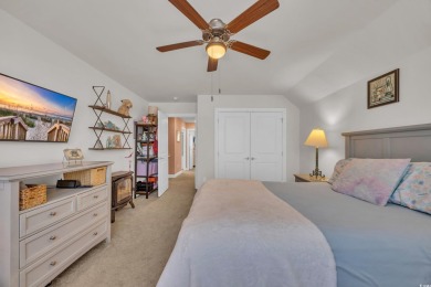 Relax on the welcoming front porch and soak up the sunshine in on Surf Golf and Beach Club in South Carolina - for sale on GolfHomes.com, golf home, golf lot