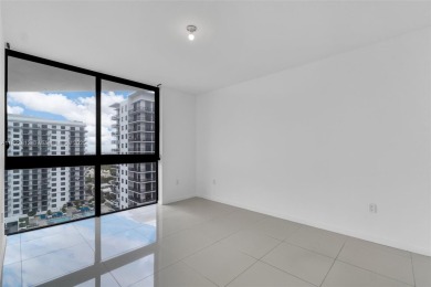 Live the urban lifestyle at 5252 Paseo! Bright and modern 1 on Doral Golf Resort in Florida - for sale on GolfHomes.com, golf home, golf lot