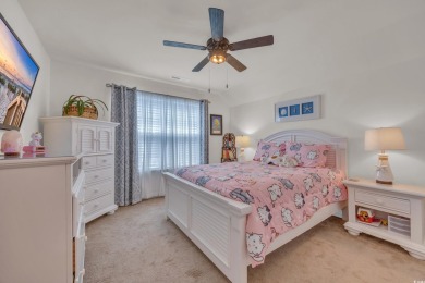 Relax on the welcoming front porch and soak up the sunshine in on Surf Golf and Beach Club in South Carolina - for sale on GolfHomes.com, golf home, golf lot