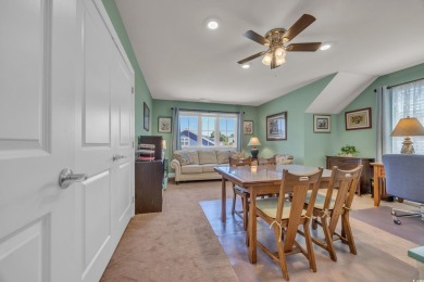Relax on the welcoming front porch and soak up the sunshine in on Surf Golf and Beach Club in South Carolina - for sale on GolfHomes.com, golf home, golf lot