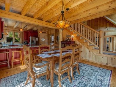 Classic log cabin, conveniently located behind the gates of on Rumbling Bald Resort on Lake Lure in North Carolina - for sale on GolfHomes.com, golf home, golf lot