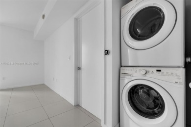 Live the urban lifestyle at 5252 Paseo! Bright and modern 1 on Doral Golf Resort in Florida - for sale on GolfHomes.com, golf home, golf lot