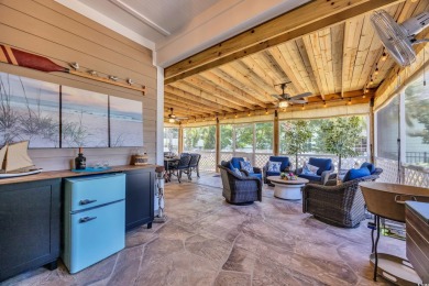 Relax on the welcoming front porch and soak up the sunshine in on Surf Golf and Beach Club in South Carolina - for sale on GolfHomes.com, golf home, golf lot