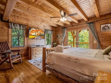 Classic log cabin, conveniently located behind the gates of on Rumbling Bald Resort on Lake Lure in North Carolina - for sale on GolfHomes.com, golf home, golf lot