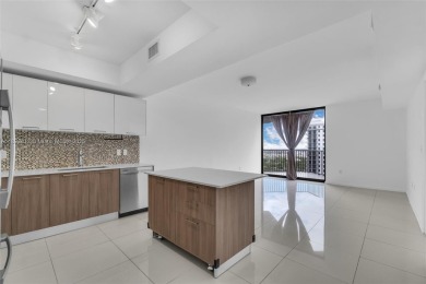 Live the urban lifestyle at 5252 Paseo! Bright and modern 1 on Doral Golf Resort in Florida - for sale on GolfHomes.com, golf home, golf lot
