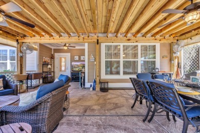 Relax on the welcoming front porch and soak up the sunshine in on Surf Golf and Beach Club in South Carolina - for sale on GolfHomes.com, golf home, golf lot