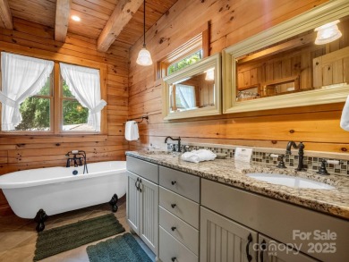 Classic log cabin, conveniently located behind the gates of on Rumbling Bald Resort on Lake Lure in North Carolina - for sale on GolfHomes.com, golf home, golf lot