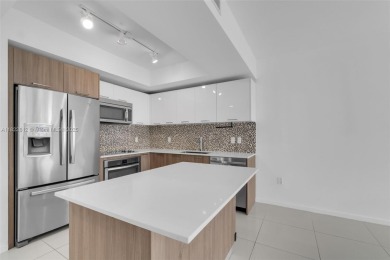 Live the urban lifestyle at 5252 Paseo! Bright and modern 1 on Doral Golf Resort in Florida - for sale on GolfHomes.com, golf home, golf lot
