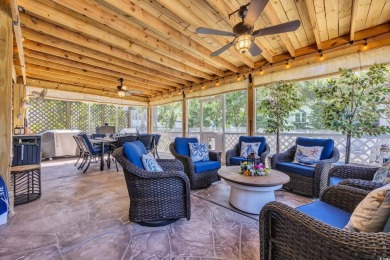 Relax on the welcoming front porch and soak up the sunshine in on Surf Golf and Beach Club in South Carolina - for sale on GolfHomes.com, golf home, golf lot