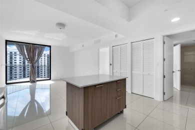 Live the urban lifestyle at 5252 Paseo! Bright and modern 1 on Doral Golf Resort in Florida - for sale on GolfHomes.com, golf home, golf lot