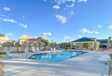 Relax on the welcoming front porch and soak up the sunshine in on Surf Golf and Beach Club in South Carolina - for sale on GolfHomes.com, golf home, golf lot