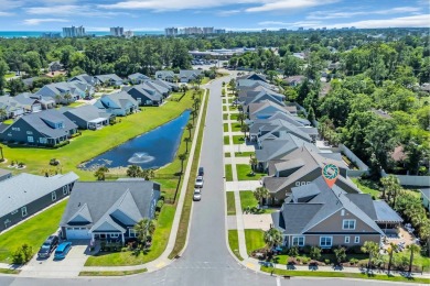 Relax on the welcoming front porch and soak up the sunshine in on Surf Golf and Beach Club in South Carolina - for sale on GolfHomes.com, golf home, golf lot