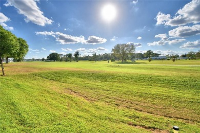 WELCOME TO YOUR BACKYARD OASIS!!!  MOVE-IN-READY, COMPLETELY on Lily Lake Golf and RV Resort in Florida - for sale on GolfHomes.com, golf home, golf lot