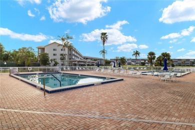 UPDATED main level CONDO with GOLF! Panoramic views of water on Golfview Golf and Racquet Club in Florida - for sale on GolfHomes.com, golf home, golf lot