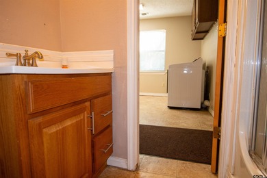 Lakefront classic! Brick ranch style home is ready for on Holly Lake Ranch Golf Club in Texas - for sale on GolfHomes.com, golf home, golf lot