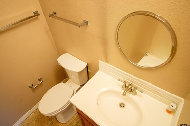 Lakefront classic! Brick ranch style home is ready for on Holly Lake Ranch Golf Club in Texas - for sale on GolfHomes.com, golf home, golf lot