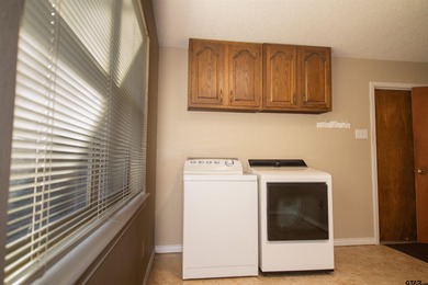 Lakefront classic! Brick ranch style home is ready for on Holly Lake Ranch Golf Club in Texas - for sale on GolfHomes.com, golf home, golf lot